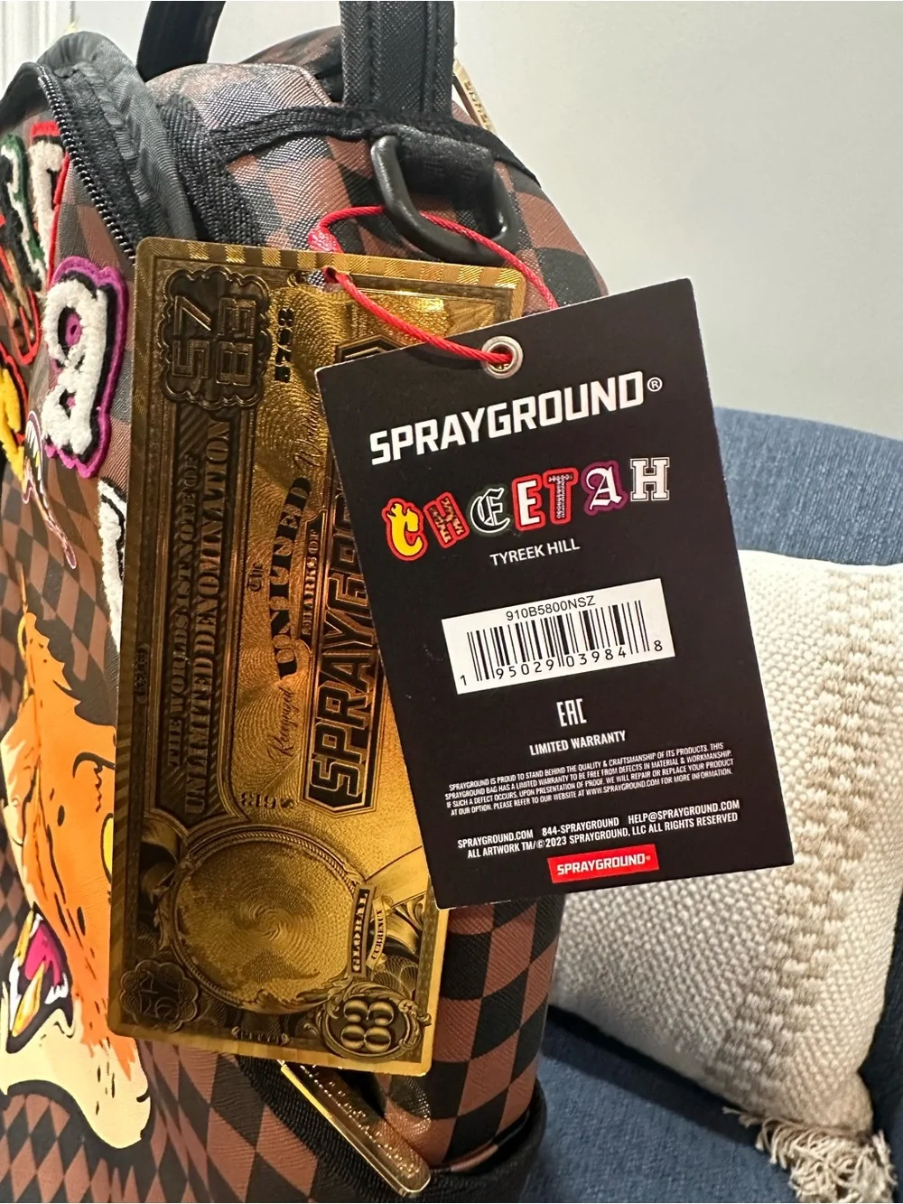 Sprayground Brown Checkerboard Backpack with Orange Tiger Patch